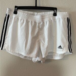 Adidas Women's White Athletic Shorts with Black Stripes